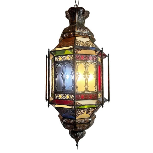 Beautiful extra large vintage hand crafted Moroccan chandelier with red, blue, green, and frosted glass. Great statement...