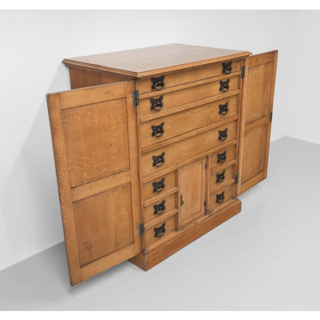 Unique large Arts & Crafts oak Cotswold cabinet with enclosed drawers. Hand written to the underside 'May 1906 John 3...