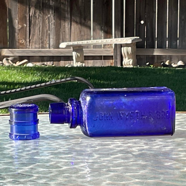 Rare John Wyeth & Bro. Eyewash Bottle with glass applicator that has a patent date of May 18th. 1899 on the bottom. This...