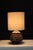 Roberto Rigon style lamp. Embossed ceramic glazed in coco brown and mustard yellow finish. Highlighting the abstract...