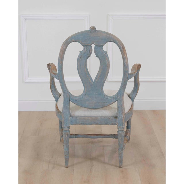 Made in Sweden around 1780, this large Gustavian armchair is of the Swedish Model, repainted in blue and newly covered in...