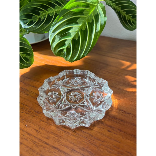 Vintage Anchor Hocking Early American Press Cut Early Starburst Crystal 4 Slot Ashtray in good condition. Beautiful and...