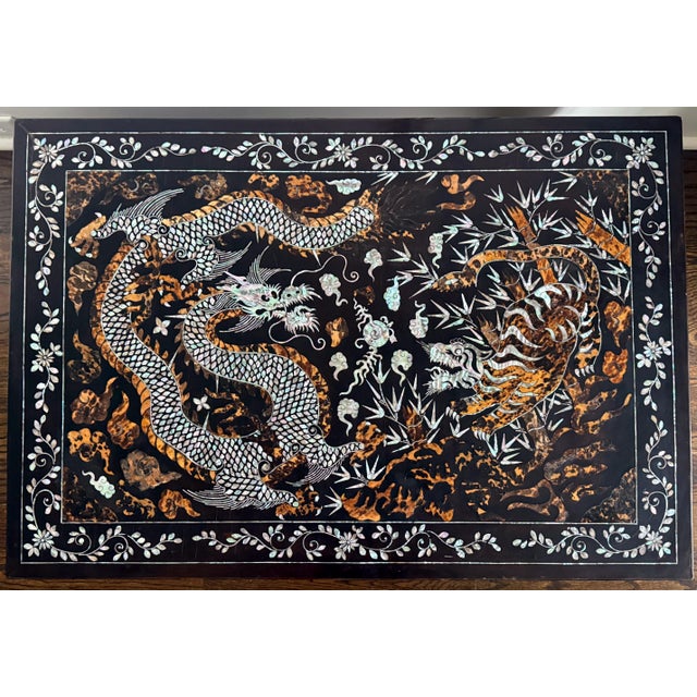 A Korean black lacquered wood low table with fine inlay works circa Joseon dynasty (19th century), Musuem quality. The low...