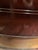 This is a mahogany bowfront dresser made by Drexel Furniture Company. The dresser has a glass cover. The glass was removed...