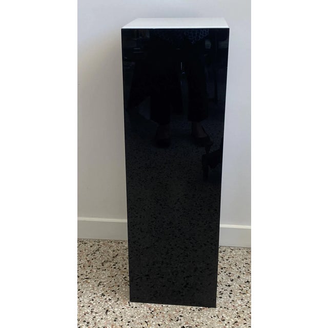 This black and white illuminated Lucite pedestal was a custom made piece in the 1990s. Note: Requires one Edison based...