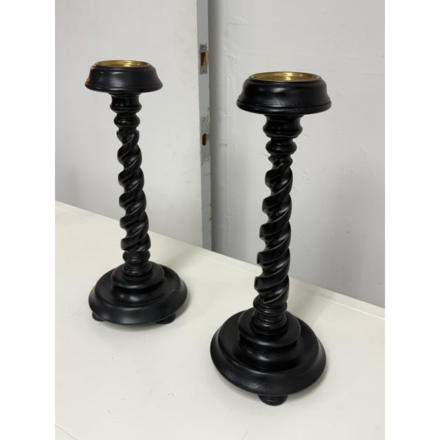 Design Plus Gallery presents a Pair of Barley Twist Wood Candleholders from Global Views. Each candleholder has a spiral-...