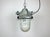 Grey industrial explosion proof light with massive protective glass bulb. Made in former Czechoslovakia by Elektrosvit...