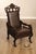 High Quality Antique Unusual Reclining Hardwood Armchair Featuring Carved Figural Human, Elephant Crest, Human Hand Arm...