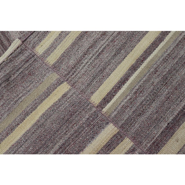 Measures: 9'6 x 11' Elegant Vintage Turkish Kilim Room-Size Rug with Mauve and Yellow Stripes 9'6 x 11'. Keivan Woven Arts...
