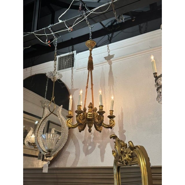 The 19th c. French Giltwood Chandelier is a stunning lighting fixtures that exudes elegance and sophistication. This...