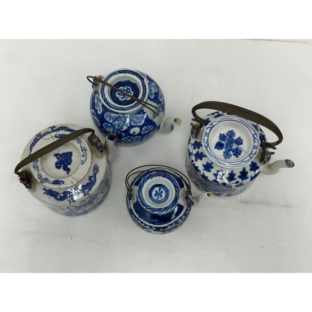Design Plus Gallery presents a Set of Four Teapots of Blue & White Porcelain from China. The seat has traditional...