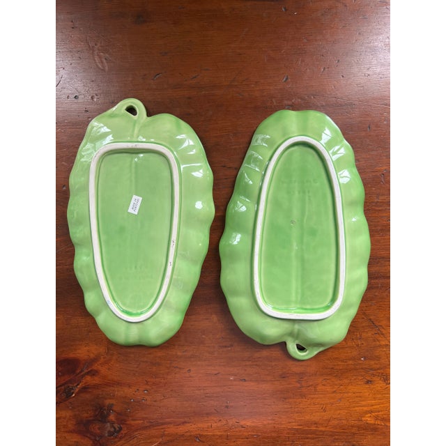 This vintage pair of hand painted tropical leaf plates is perfect for hosting during warmer temperatures. These can be...