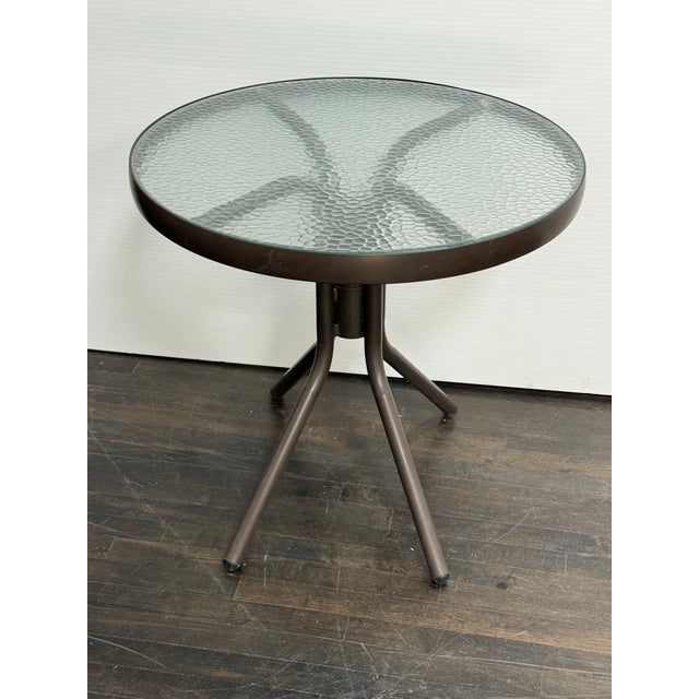 Design Plus Gallery presents a Vintage Outdoor Bistro Table from Brown Jordan. This round table pairs a powder-coated...