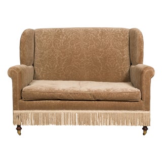 Vintage English Upholstered Loveseat with Out-Scrolling Arms and Casters For Sale