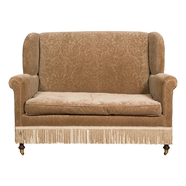 Vintage English Upholstered Loveseat with Out-Scrolling Arms and Casters For Sale