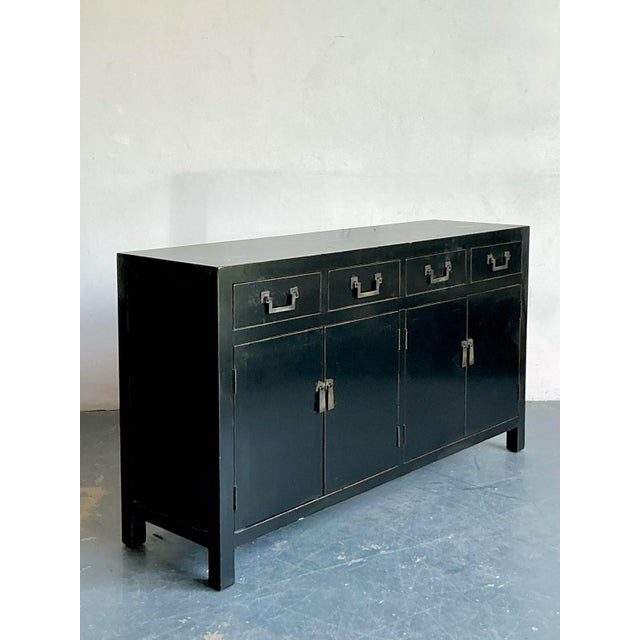 This exquisite vintage Asian black lacquered credenza embodies timeless elegance and sophisticated design. Drawing...