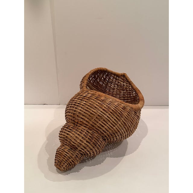 Dramatic huge rattan organic modern sculpture in the shape of a shell. Makes an unusual and striking sculptural accessory.