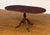 This is a mahogany table with fold down leaves. It can have multiple uses around the home. It is ideal as a small dining...