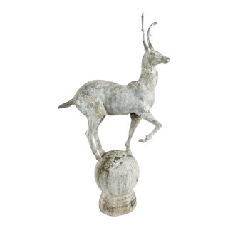 Vintage Cast Iron Gazelle Statue on Spherical Orb Base For Sale