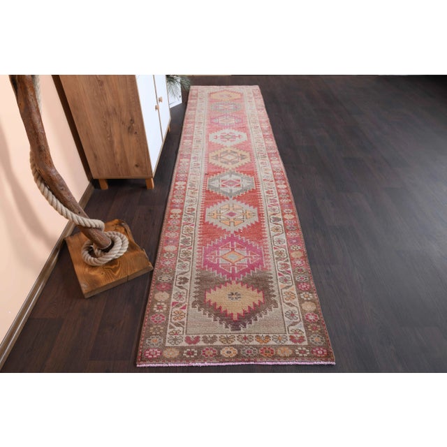 Vintage Turkish Hand-Knotted vintage rug is a semi-antique vintage runner rug.'70s Eastern region of Turkey's unique rug...