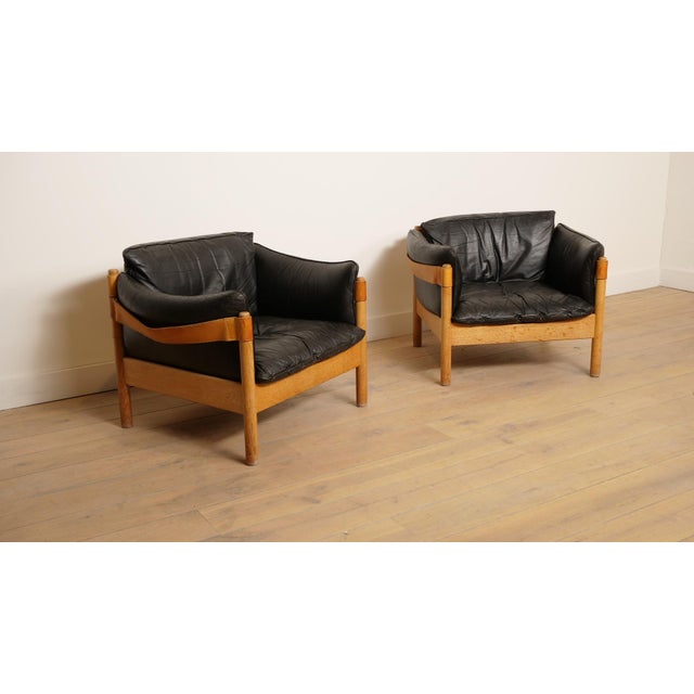 These vintage lounge armchairs combine character and comfort in one unique design. The full leather upholstery has...