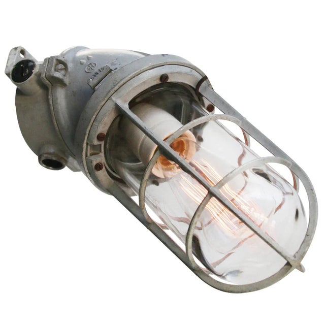 Industria rotterdam industrial cage light cast aluminium, clear glass e27 / e26. Depending on destination, all lights are...