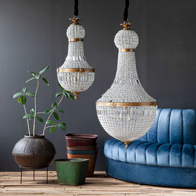 New special order item. Not vintage.The empire-style Bezier Prism Chandelier is intricately composed of clear glass beads...