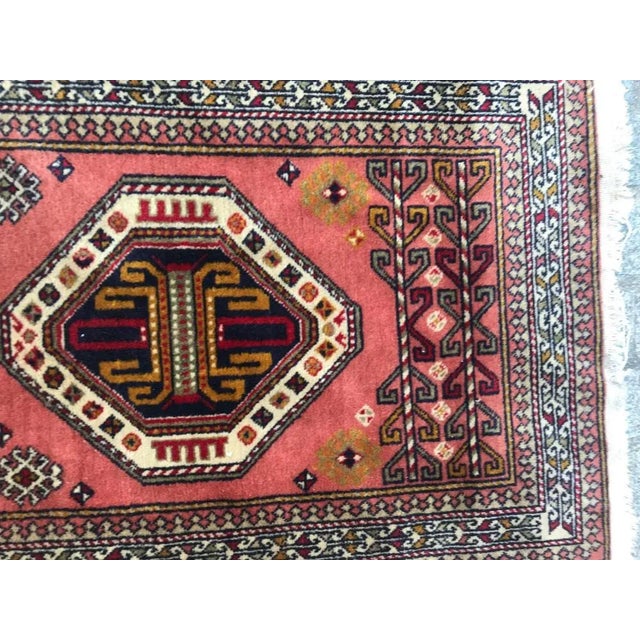 Beautiful late 20th century runner with a geometric design of Caucasian rugs and nice colors with pink, green, yellow and...