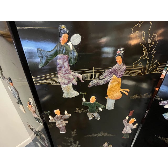 A stunning Mid Century Asian four panel floor screen room divider. The artisan piece is made in the Chinoiserie style with...