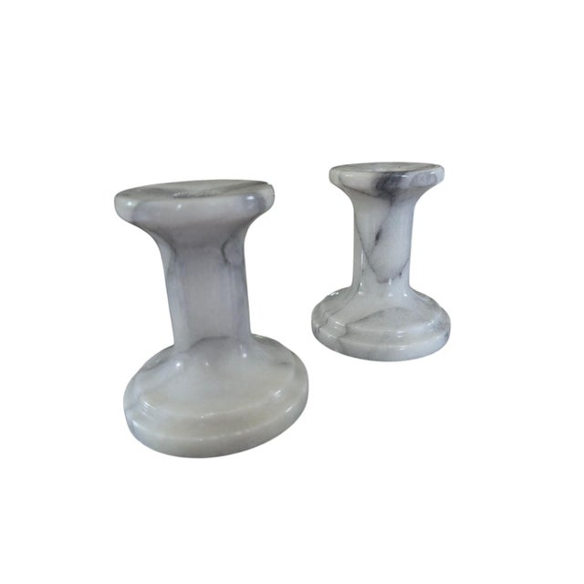 A Pair of White Marble Candle Holders Pair with Tapered Candles in any color! Each Holder is 4" Tall