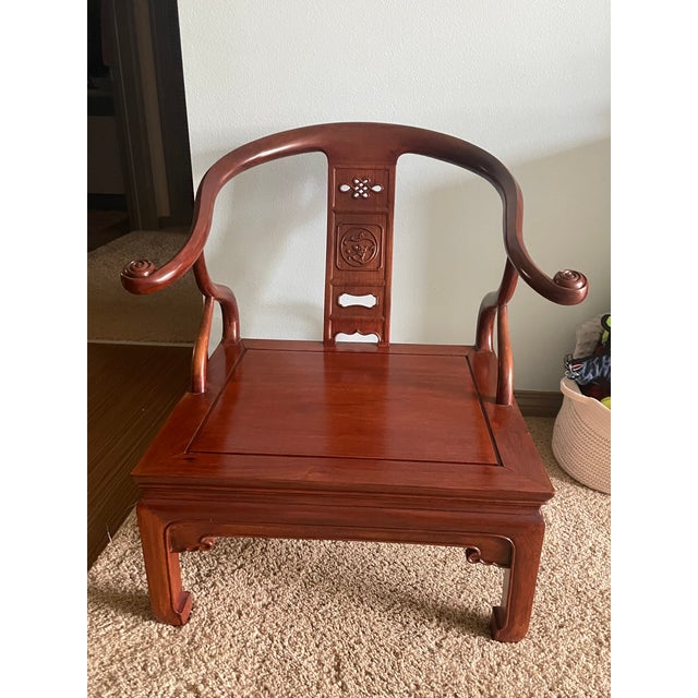 Pair of vintage 1960 carved rosewood armchairs imported from Hong Kong. Both have mint condition ivory silk faille...
