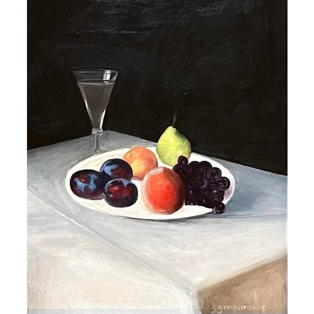 Oil painting in the Dutch style on okoume board (similar to mahogany) of a still life with an orange, a peach, three...