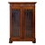 A fine Biedermeier bookcase in the Gothic taste, circa 1830. The case of oak construction clad in mahogany veneers. A...