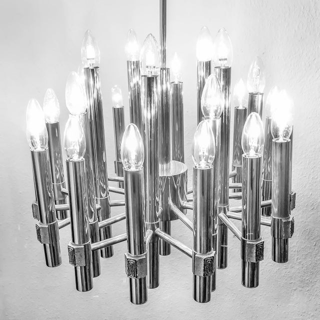 This impressive chandelier was designed by angelo brotto for esperia in italy in the 1960s. It is one of a whole series...