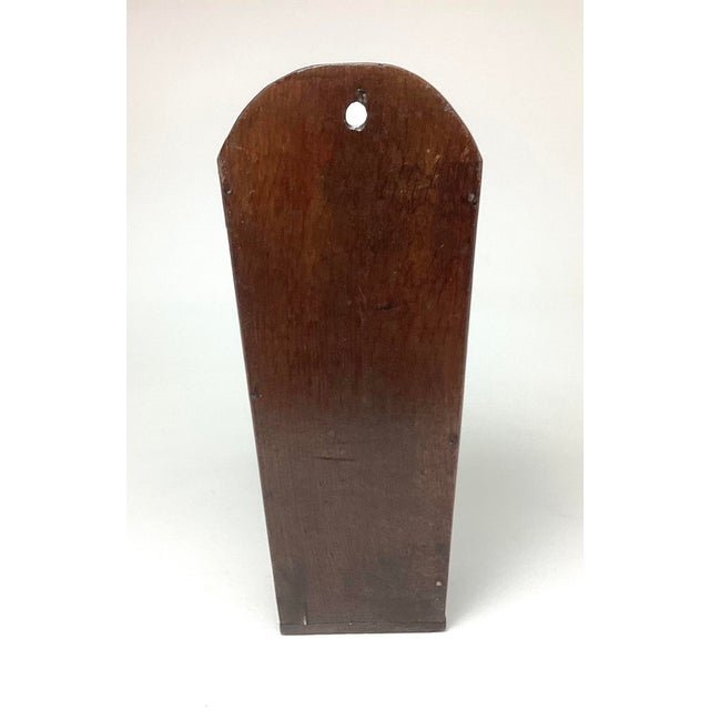 Antique English Oak Wall Candle Box. It features a tapering form designed to be wall-mounted, historically keeping candles...