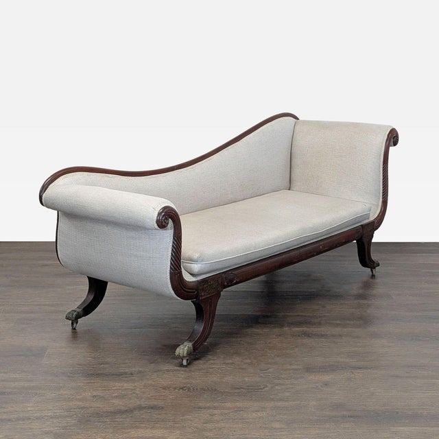Antique couch (maybe 19th century). Wheels on the feet. Carved wood frame and legs. Reupholstered in 2020. Dimensions...
