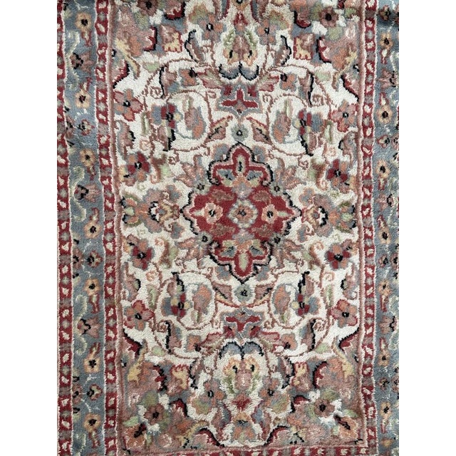 Nice 20th century Pakistani rug with beautiful floral design and nice colours with a white field, pink , blue , yellow and...
