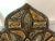 A vintage arched Moroccan vanity or wall mirror, handmade of natural bone and engraved with beautiful tribal designs. The...