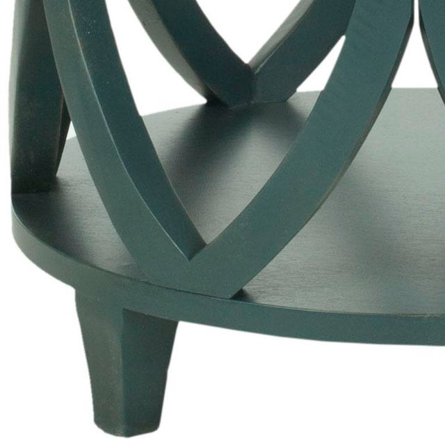 With it's stylish modern geometric shape crafted of pine in dark teal finish, the Accent Table brings chic, organic style...