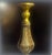 Elegant pair of vintage decorative candlesticks featuring richly detailed brown and gold-tone finishes with ornate...