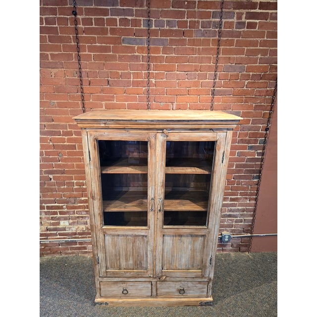 This stunning, handcrafted cabinet blends timeless character with functional storage. Made from solid reclaimed wood, it...