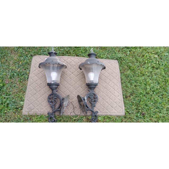 Vintage Colonial Era Pair of Ornate Outdoor Wall Sconces/Lamps Description: Add a touch of elegance and charm to your...