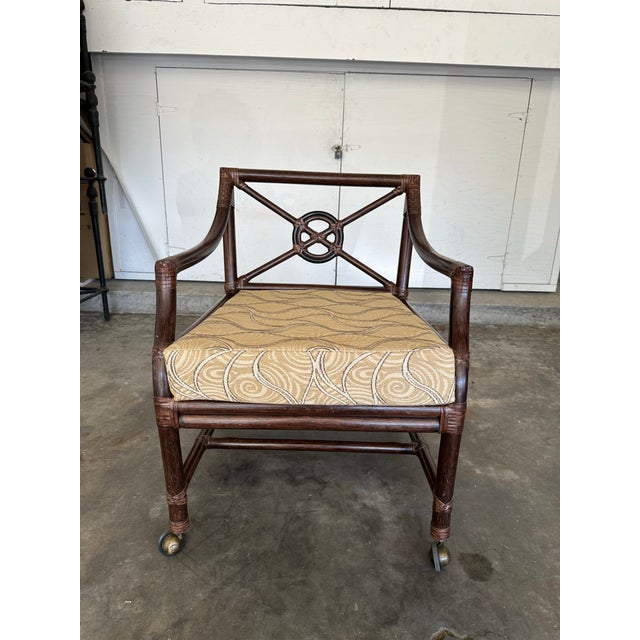 A beautiful McGuire Target Back lounge chair on casters. Purchased new in 2000. Two pairs and a single are available for...