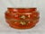 Chinese round red lacquer two part wedding box. Entirely hand decorated with a bird and flower motif on top, flowers and...