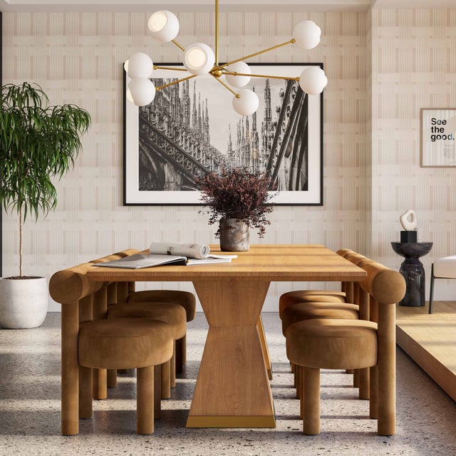 The Nolan Dining Table is a modern marvel available in natural and black wood finishes. This rectangular table features...