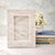 A vintage Capiz shell picture frame featuring softly iridescent panels with natural tonal variation, creating a luminous,...
