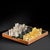 High-quality custom chess set executed in the style of iconic late 20th-century luxury design, closely resembling the...