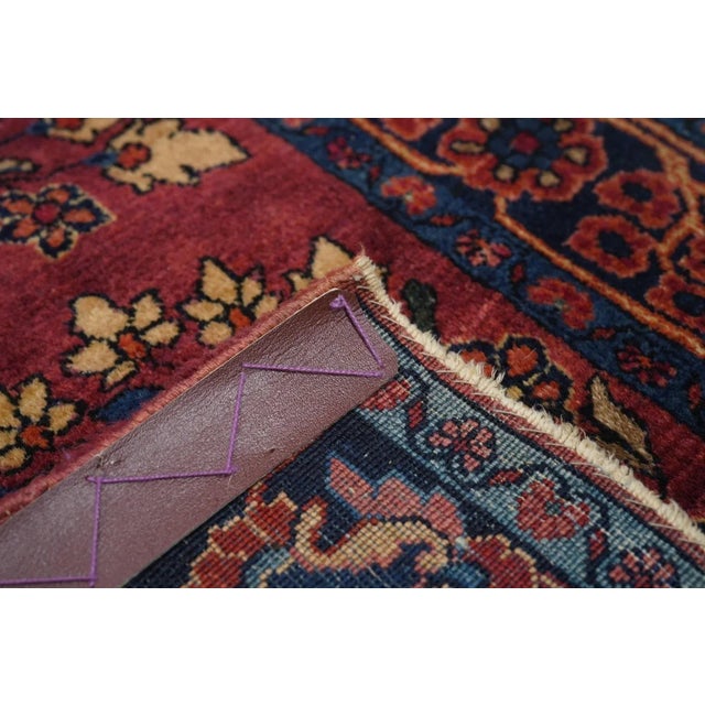 An interwar scatter with a spacious version of the incredibly popular "American Sarouk" design of detached floral sprays...