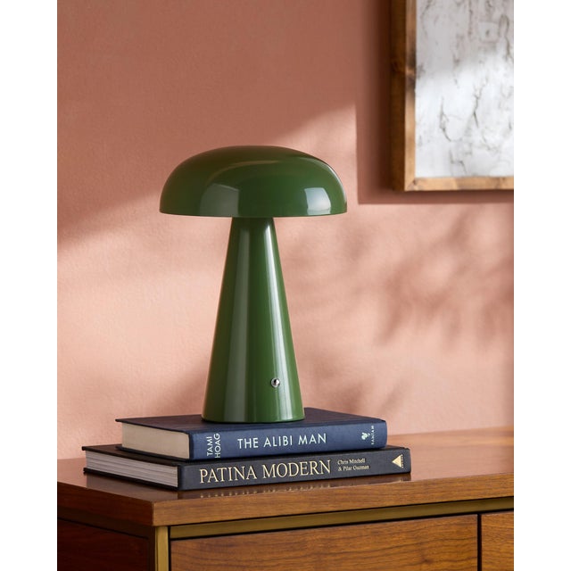 Illuminate your space with the chic and portable Umbra accent table lamp, a beacon of minimalist modern style. Standing at...