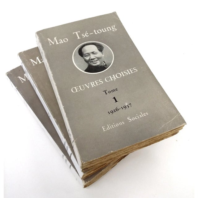 A rare set of three volumes uncut or/and unopened Mao Tse Tung books written in French. These are from a "Rare" bookshop...